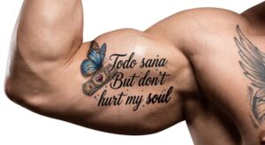 Spanish Script with Butterfly and Bandage Arm Tattoo Design Inkbulb