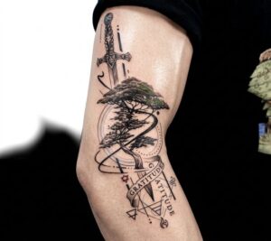 Bonsai Tree and Dagger with Gratitude Banner Arm Tattoo Design Inkbulb