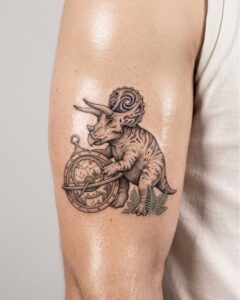 Triceratops Dinosaur with Astrolabe Arm Tattoo Design Inkbulb