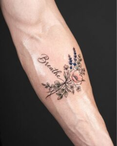 Breathe Script with Wildflowers Forearm Tattoo Design Inkbulb