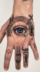 Celestial Eye and Celtic Knot Hand Tattoo Design Inkbulb