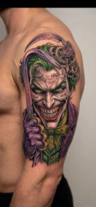 Joker with Crowbar and Gears Comic Arm Tattoo Design Inkbulb